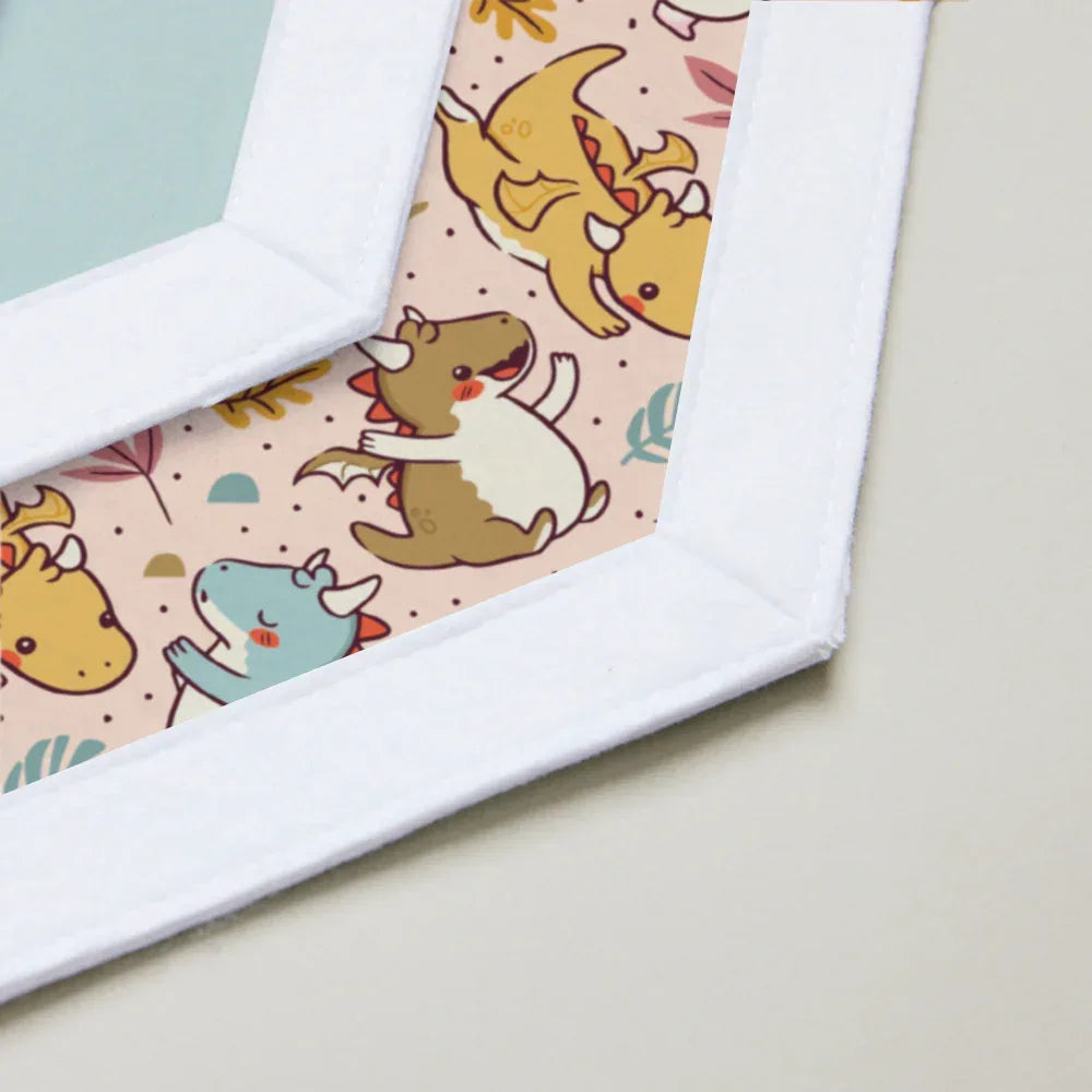 Corner of a fabric with colorful dinosaur